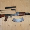 Replika-ase Kalashnikov kenttäpurku
